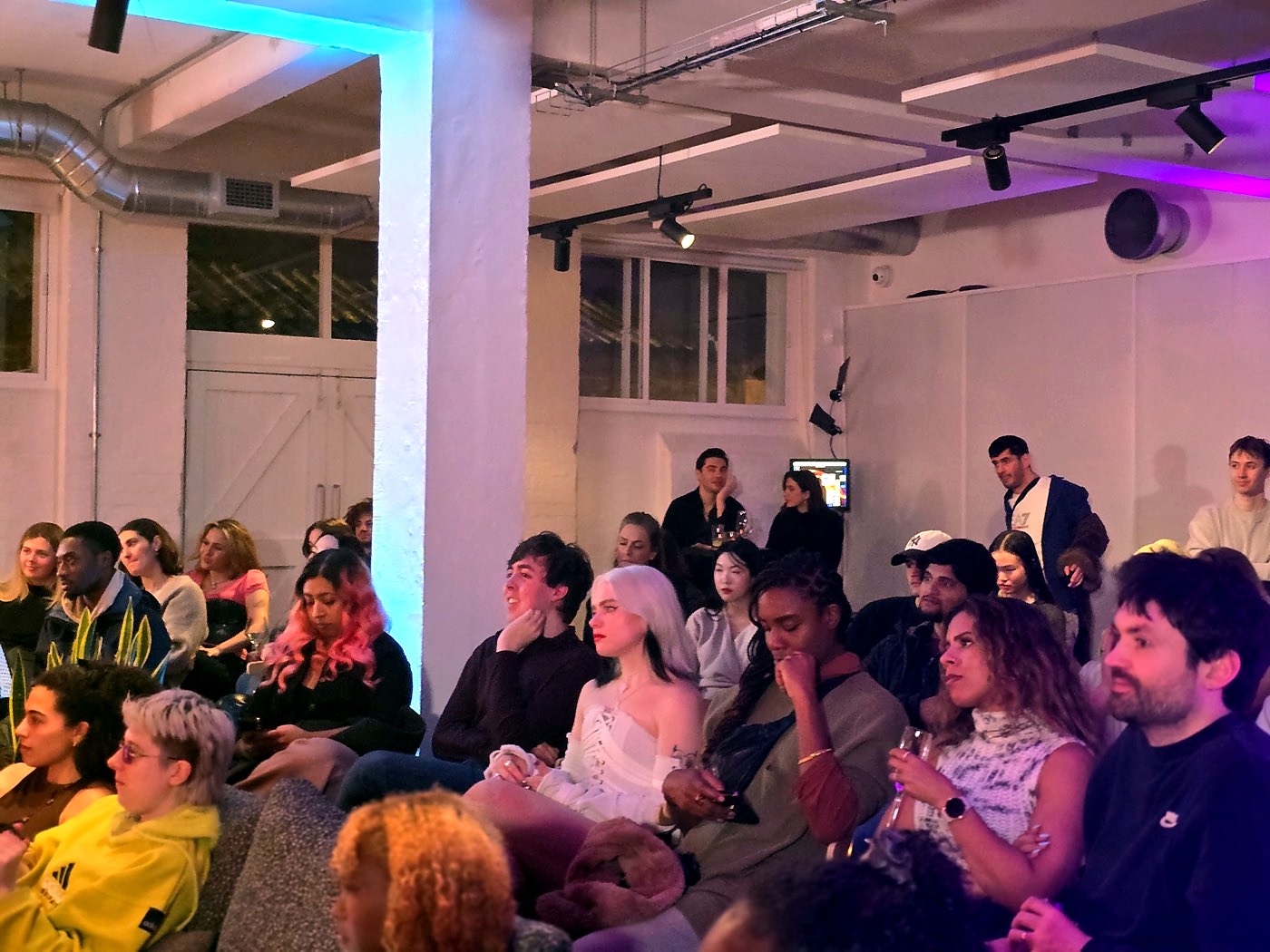 The audience at a Sonically Live session, listening.